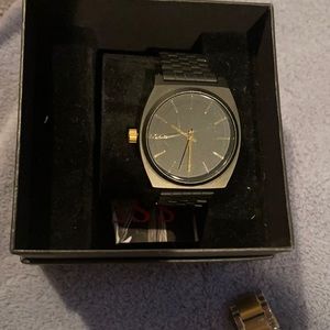 Nixon black men watch needs band repair needs battery